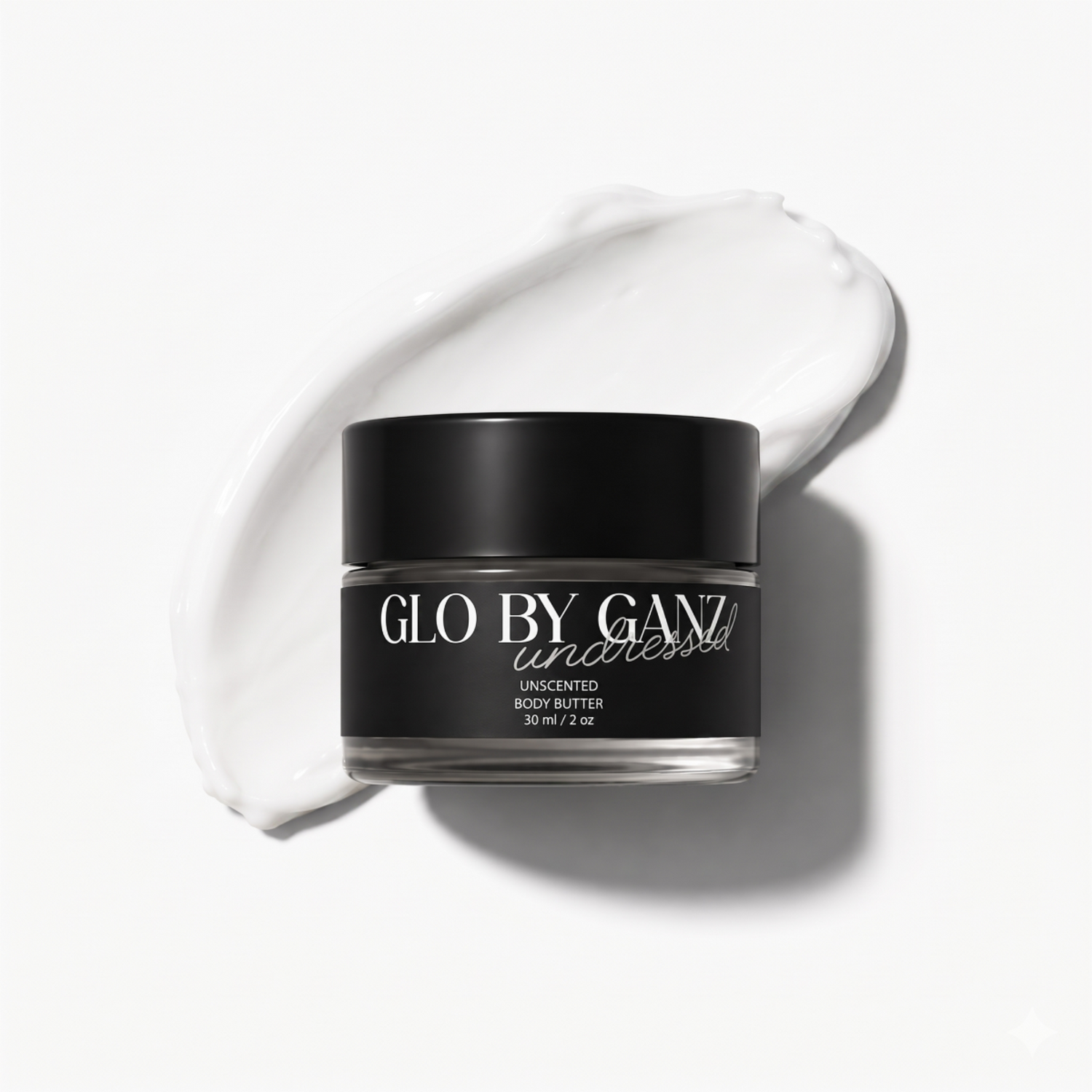 Black jar of 'Glo by Ganz' body butter on a white background